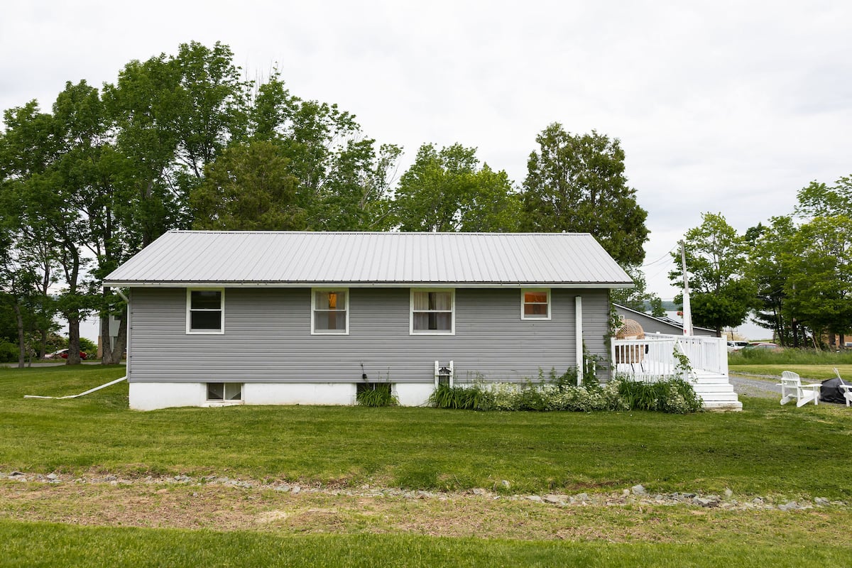 The back of the house, on a wide lawn